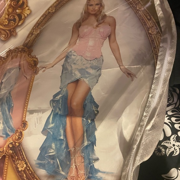 Never worn has sat in storage. XL bit fits more like a large - Picture 1 of 5